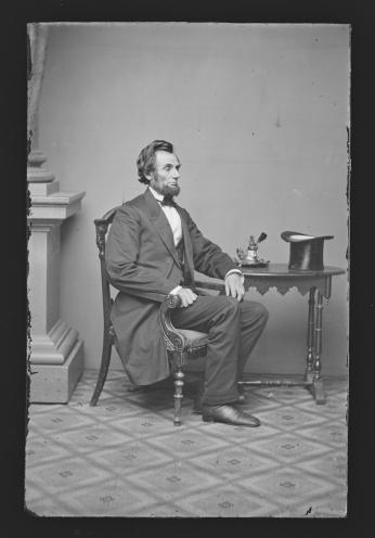 Portrait of Abraham Lincoln, seated, taken by Alexander Gardner in 1861