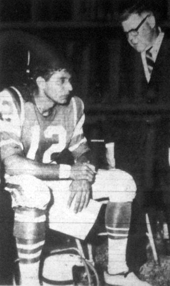 Joe Namath talks with Jets coach Weeb Ewbank during Namath's professional debut in Alexandria, Virginia, August 7, 1965. (Source: Alexandria Gazette)