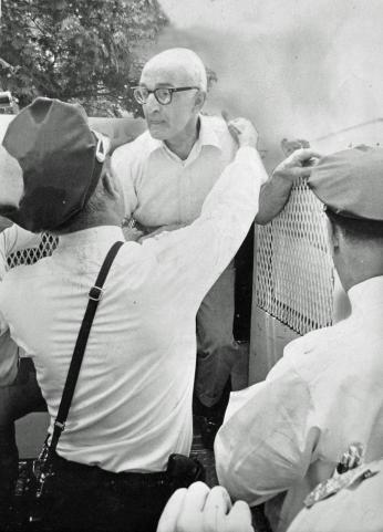 Sammie Abbott is arrested for protesting at a condemned Brookland home, June 1969 (Photo credit: Brig Cabe. Reprinted with permission of the DC Public Library, Star Collection, © Washington Post)