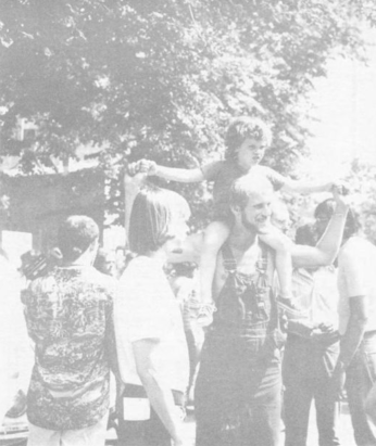 People standing around at Gay Pride Day, 1975