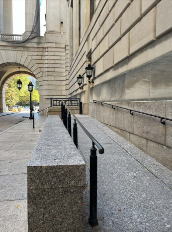 A ramp along the side of a stone building