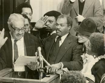 Mayor Marion Barry being sworn in at his inauguration. (Photo Source: Washington Evening Star. Used with permission from the DC Public Library Washingtoniana Special Collection)