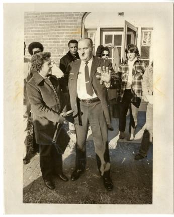 Lt. O.W. Larsen talks with his wife shortly after his release. (Photo Credit: Ken Heinen, Reprinted with permission of the DC Public Library, Star Collection, © Washington Post.)