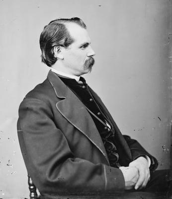 Portrait photograph of Thaddeus Lowe sitting in a suit.
