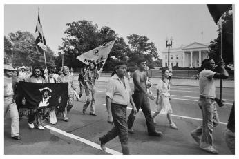 Native Americans march past the White House. (Reprinted with permission of the DC Public Library, Star Collection © Washington Post.) Calvin and Grace Coolidge stand outside the entrance to the White House