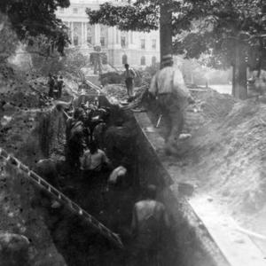  “Workmen digging tunnel between Library of Congress and U.S. Capitol, Aug. 16, 1895” (Photo Source: The Library of Congress) Workmen digging tunnel between Library of Congress and U.S. Capitol., 1895. Photograph. <a href=