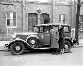 A husband and wife stand outside the Metropolitan Church (Source: Scurlock Collection/The Smithsonian)