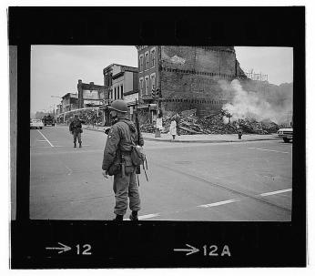 A soldier stands guard at 7th and N Street, N.W
