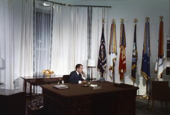 “President Nixon in the Oval Office speaking on the telephone to the Apollo XI astronauts Neil Armstrong and Edwin “Buzz” Aldrin while they were on the Moon, July 20, 1969.” (Photo Source: Richard Nixon Presidential Library and Museum Website (National Archives) https://www.archives.gov/presidential-libraries/events/centennials/nixon/exhibit/nixon-online-exhibit-calls.html “President Nixon in the Oval Office speaking on the telephone to the Apollo XI astronauts Neil Armstrong and Edwin “Buzz” Aldrin while they were on the Moon, July 20, 1969.” (Photo Source: Richard Nixon Presidential Library and Museum Website (National Archives) https://www.archives.gov/presidential-libraries/events/centennials/nixon/exhibit/nixon-online-exhibit-calls.html
