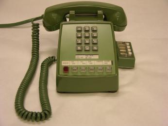 “While in the Oval Office on July 20, 1969, President Nixon used this green telephone to talk to the Apollo XI astronauts as they walked on the Moon.” (Photo Source: Richard Nixon Presidential Library and Museum Website (National Archives) https://www.archives.gov/presidential-libraries/events/centennials/nixon/exhibit/nixon-online-exhibit-calls.html