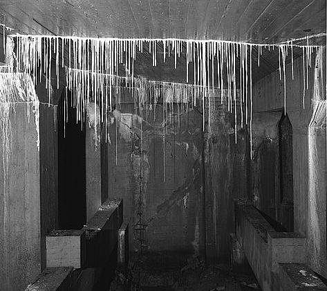 Lincoln Memorial. View of wall in northeast corner of undercroft approachway from walkway with hanging stalactites
