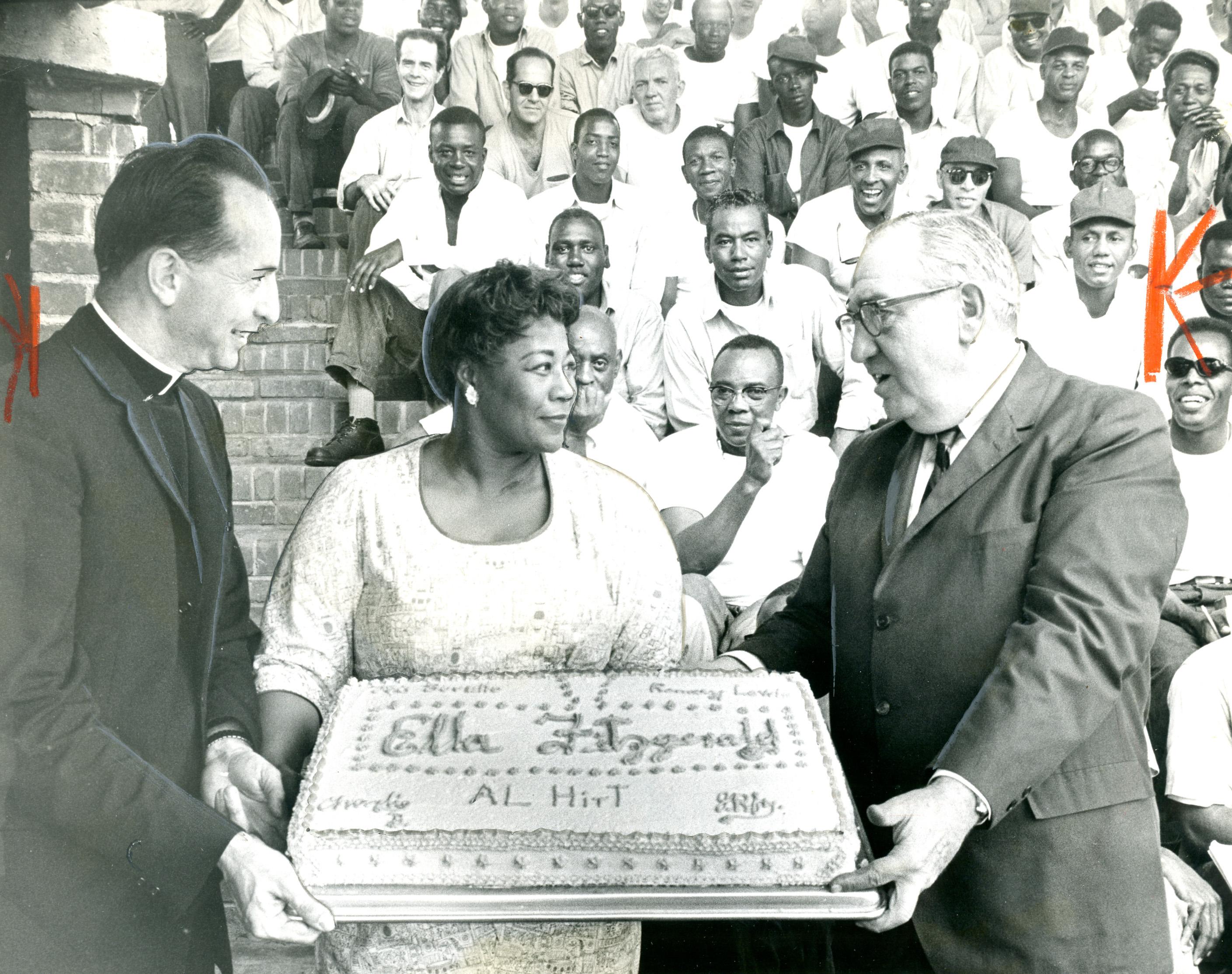 Ella Fitzgerald presented with cake at Lorton Jazz Festival. (Credit: Reprinted with permission of the DC Public Library, Star Collection, © Washington Post.)