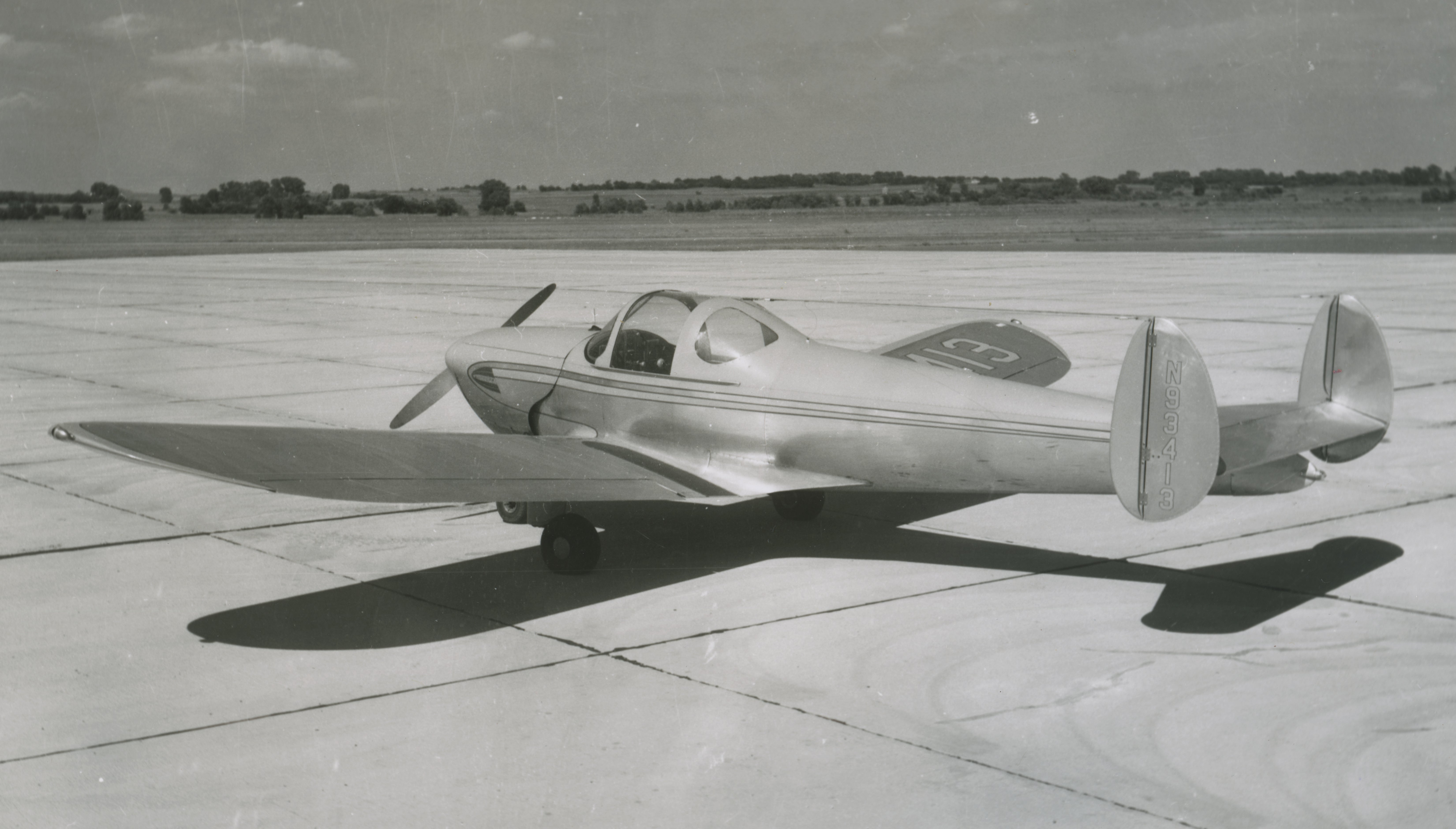 Small airplane sitting on runway.