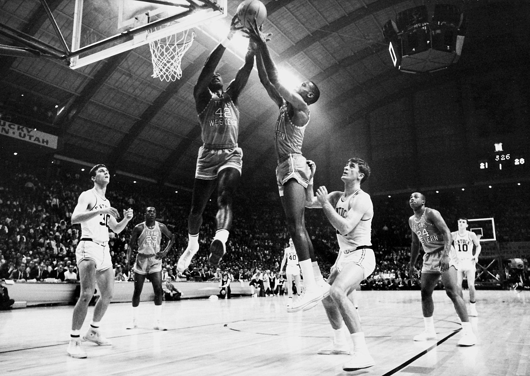 David Lattin (42) and a Texas Western teammate compete for control of a rebound as Kentucky's Tommy Kron, left, and Pat Riley , right, look on during the 1966 NCAA Photos via Getty Images Championship. Texas Western defeated Kentucky 72-65 for the championship title and was the first team to have an.. all-.black starting five compete in the NCAA Photos via Getty Images final. Rich Clarkson/NCAA Photos via Getty Images