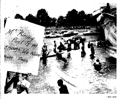 Children splash in the fountain at Columbus Circle to protest a shortage of pools in Washington, D.C. 