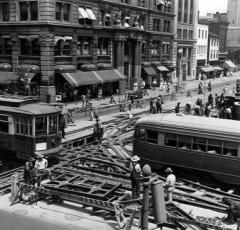 Workers repair streetcar tracks at 14th and G Streets NW in 1941. Source: Library of Congress